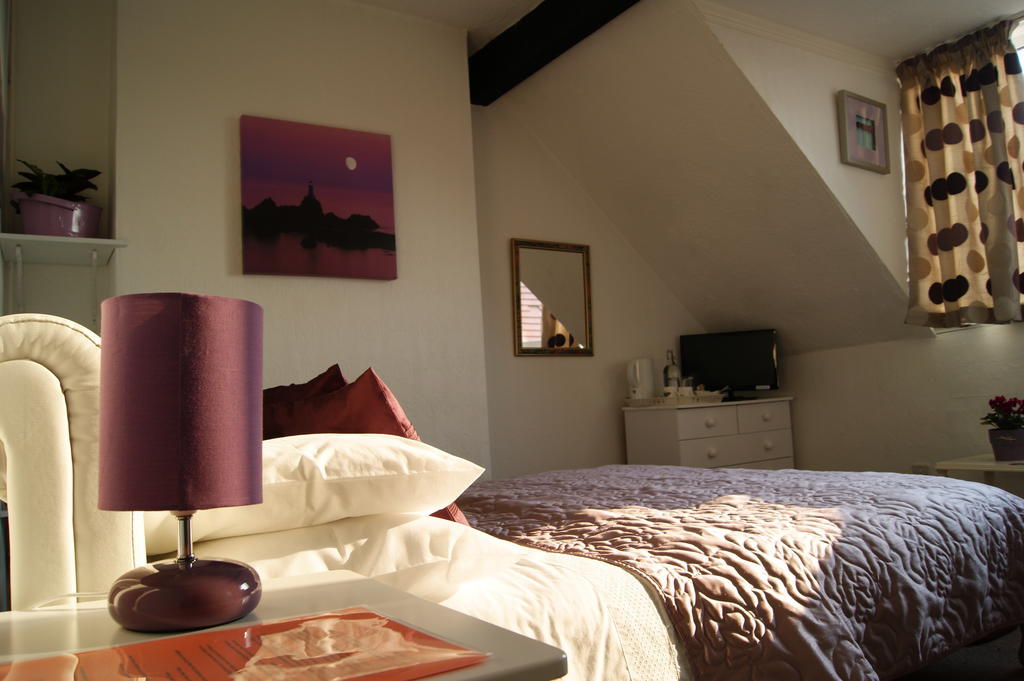 Sunset Guest House Hunstanton Quarto foto A bedroom at the Old Post Office