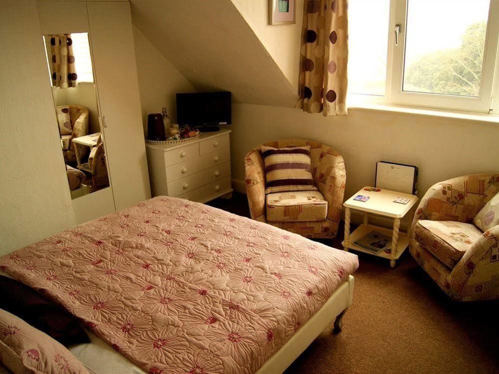 Sunset Guest House Hunstanton Exterior foto A bedroom in a typical residential home